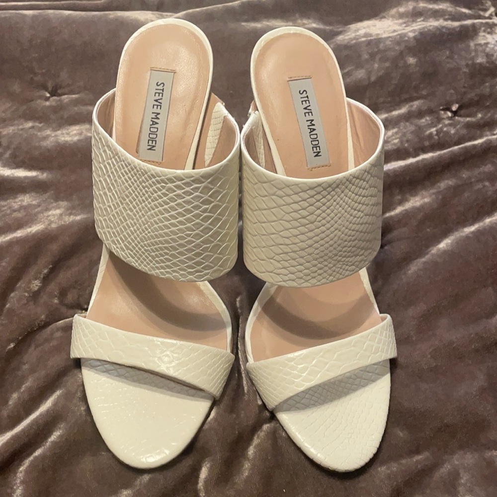 Steve Madden cream snake print mules.